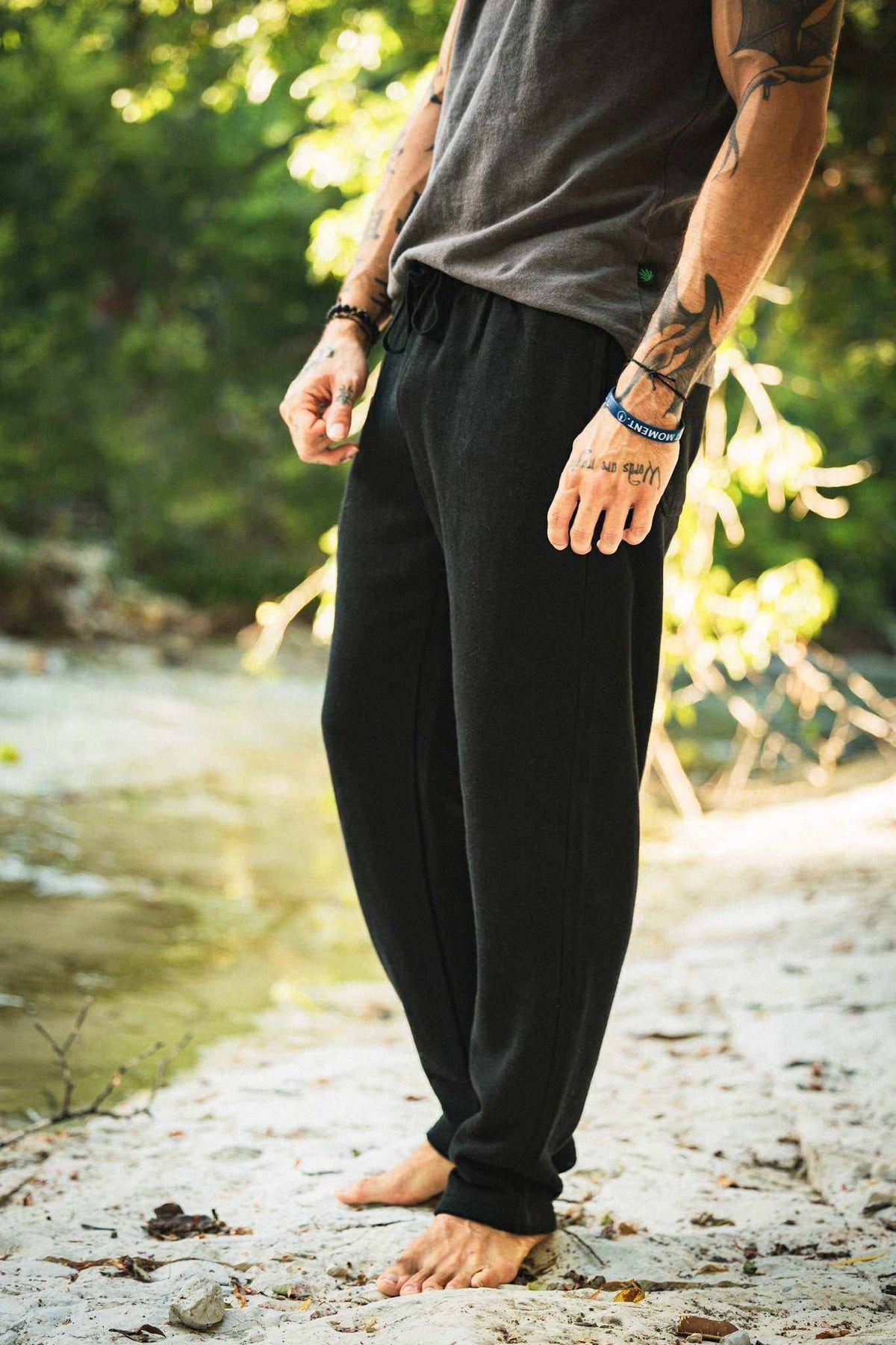 Hemp Sweatpants in black fleece with a slim fit, elastic waistband, and tapered legs with ankle cuffs