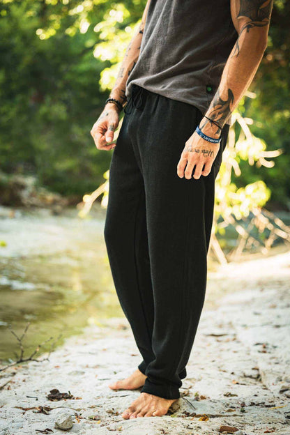 Hemp Sweatpants in black fleece with a slim fit, elastic waistband, and tapered legs with ankle cuffs