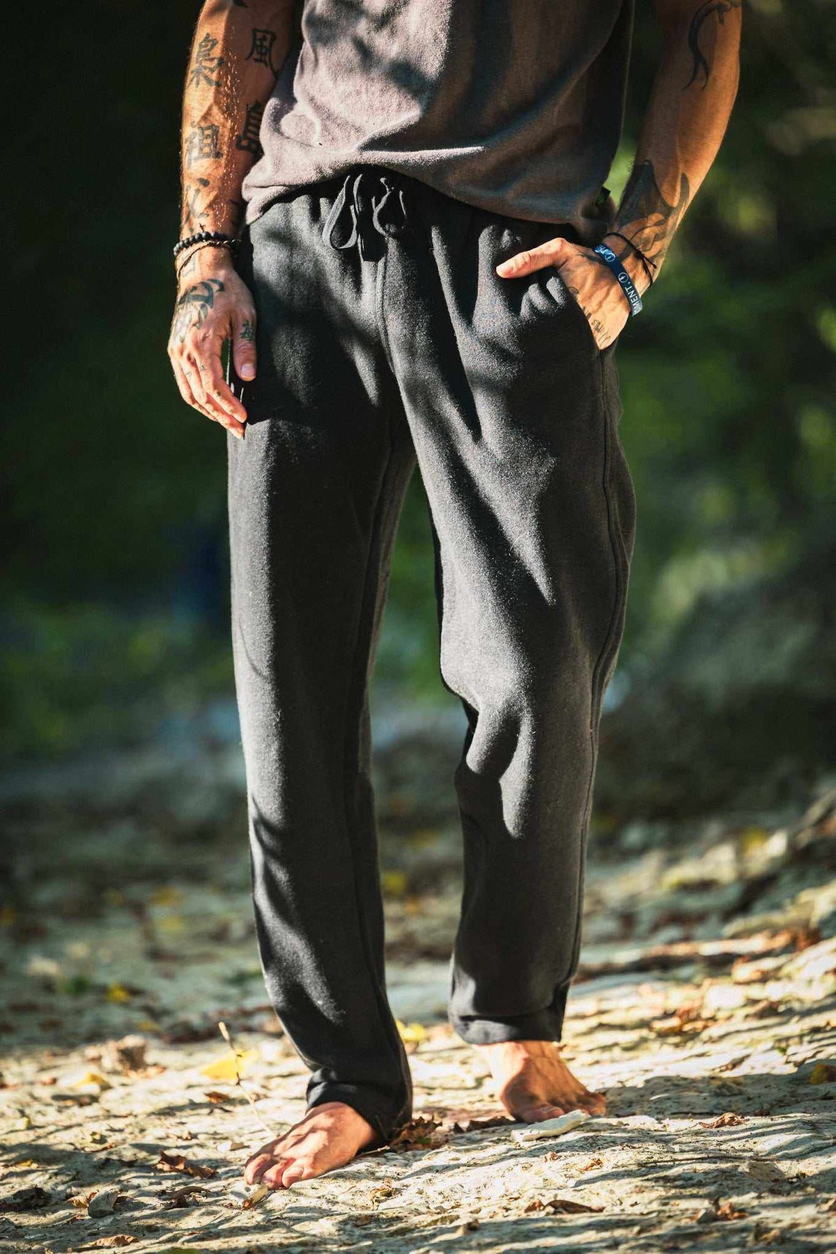 Hemp Sweatpants in charcoal gray fleece with a relaxed tapered fit, drawstring waist, side pockets, and cuffed ankles