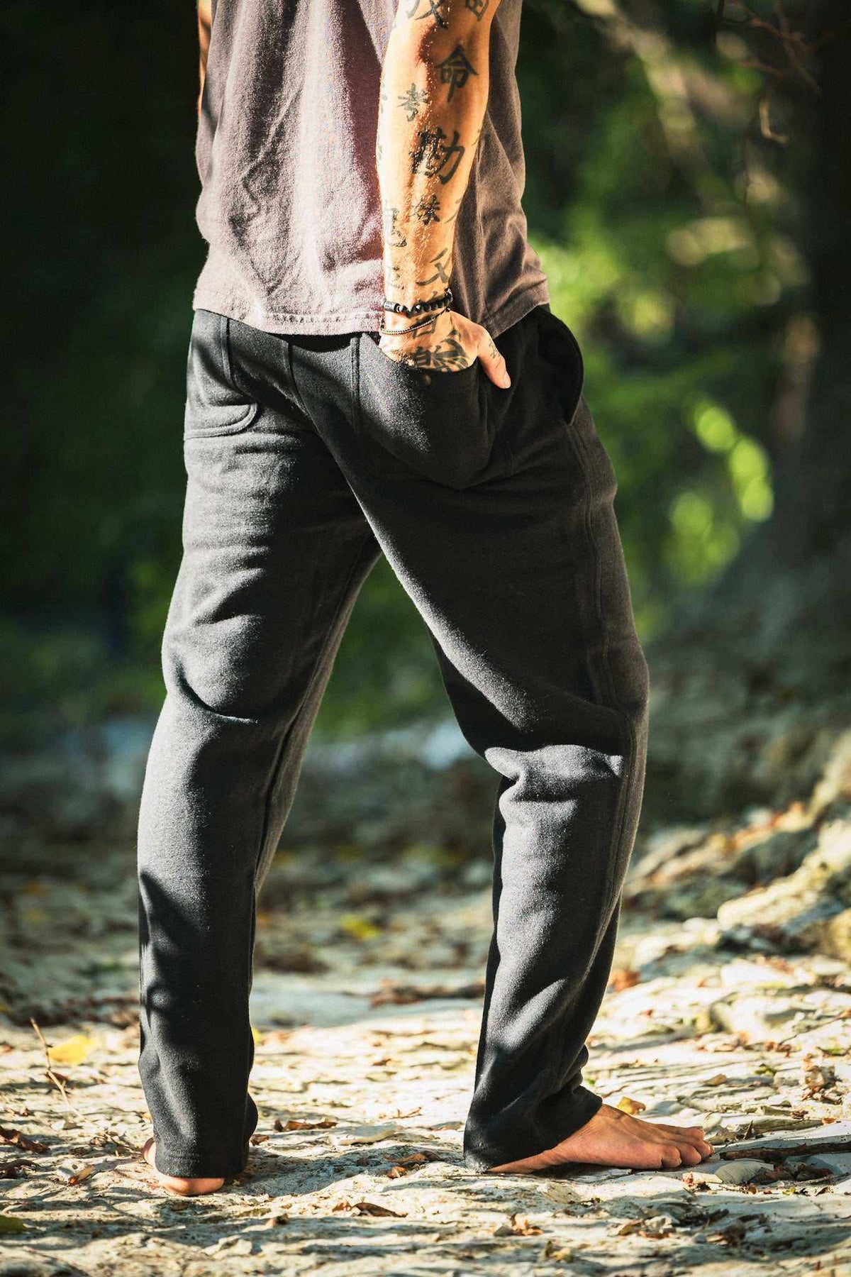 Hemp Sweatpants in charcoal gray fleece with a slim fit, elastic waistband, side pockets, and tapered legs