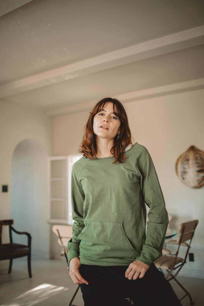 Hemp Sweatshirt Women in muted olive green, with long sleeves, a relaxed fit, and a front kangaroo pocket
