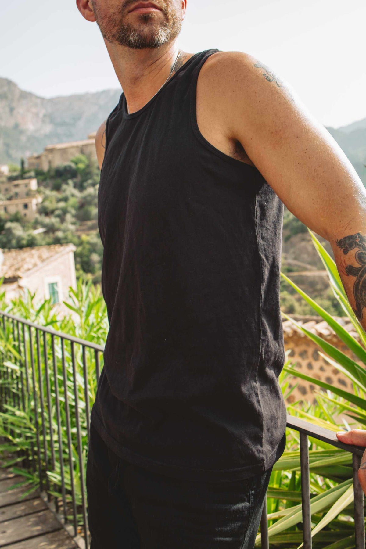 Hemp Tank Top in black with a lightweight, sleeveless muscle cut and simple solid-color design
