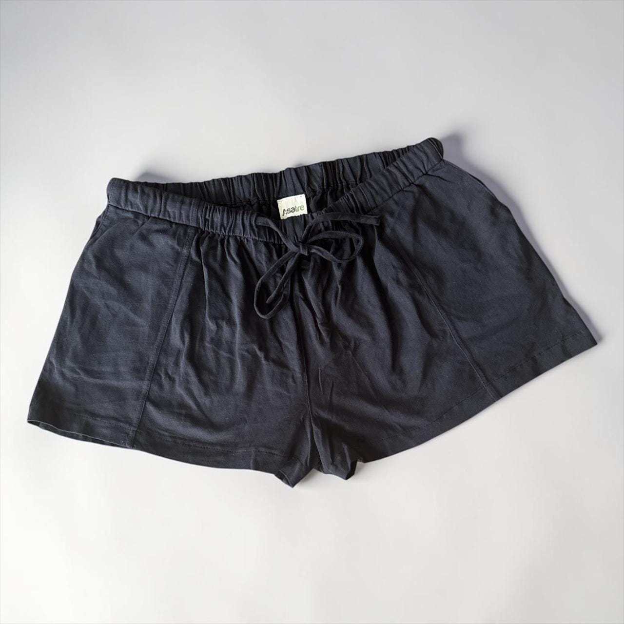 Black women's lounge shorts with drawstring waist and deep pockets made from hemp and organic cotton blend