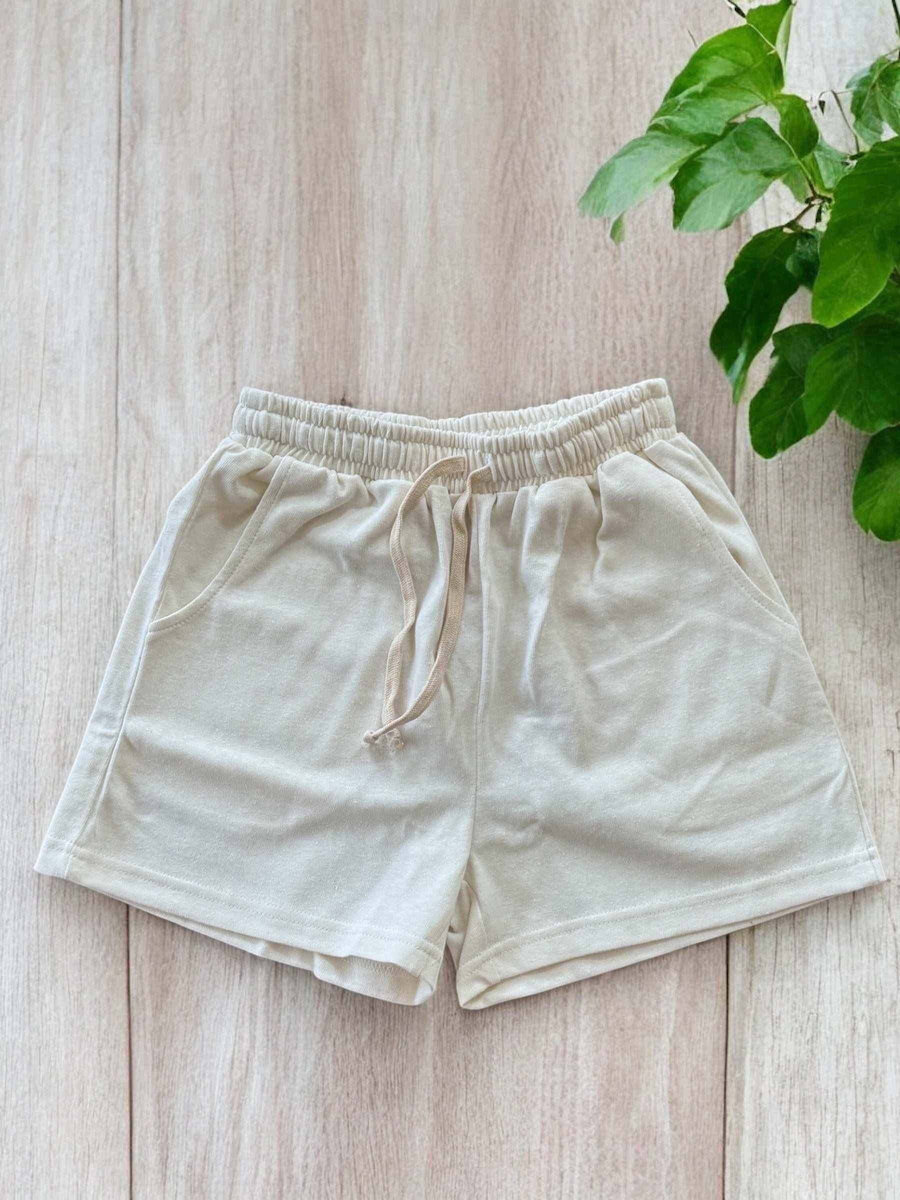 Women's hemp and organic cotton jersey shorts with elastic waist and drawstring, ideal for comfort and sustainability.