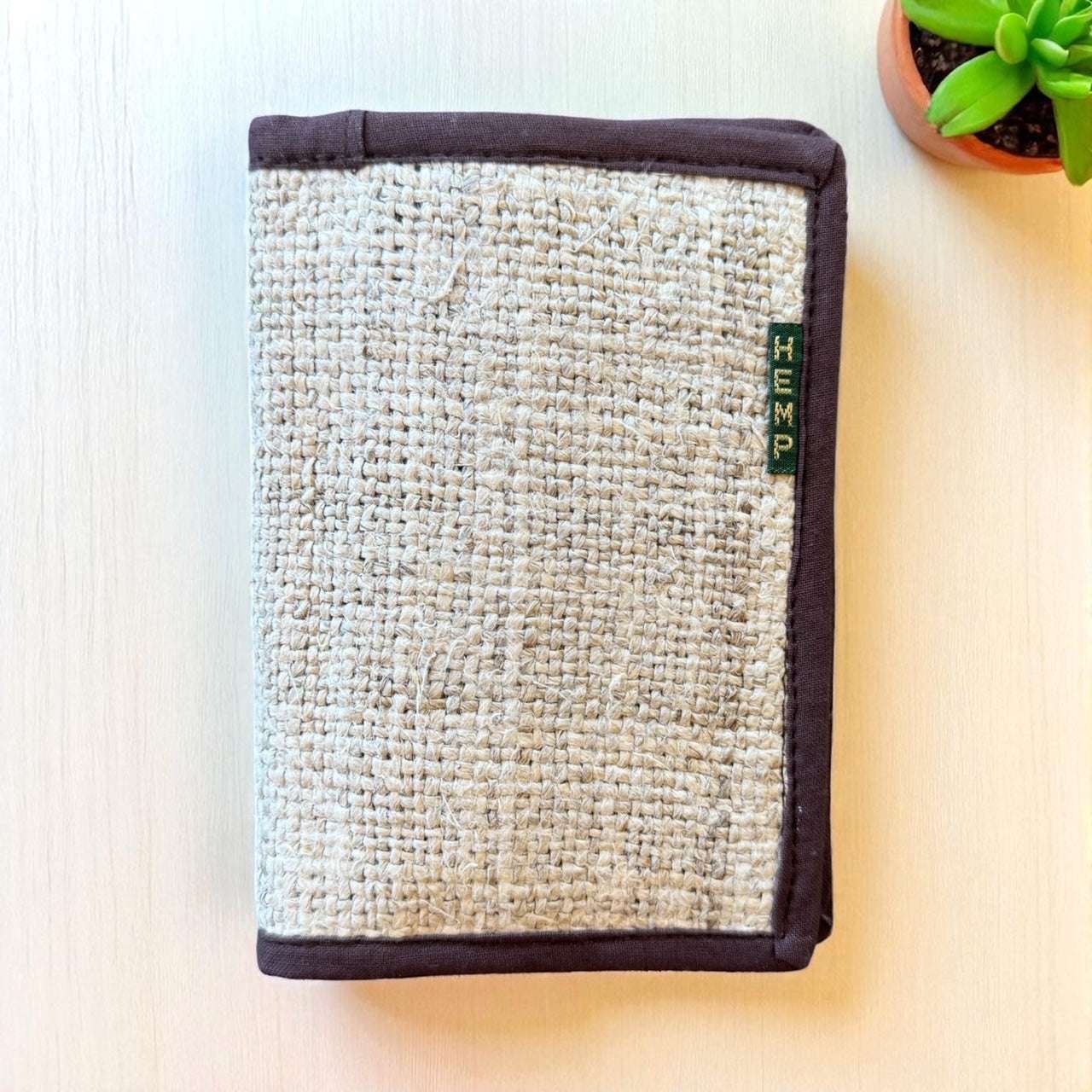 Textured rectangular object with 'Hemp' label on a light background