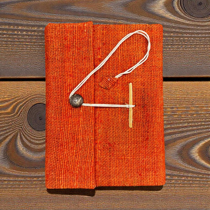 Eco-friendly hemp fabric notebook journal with cotton string closure and recycled paper, handmade in Nepal