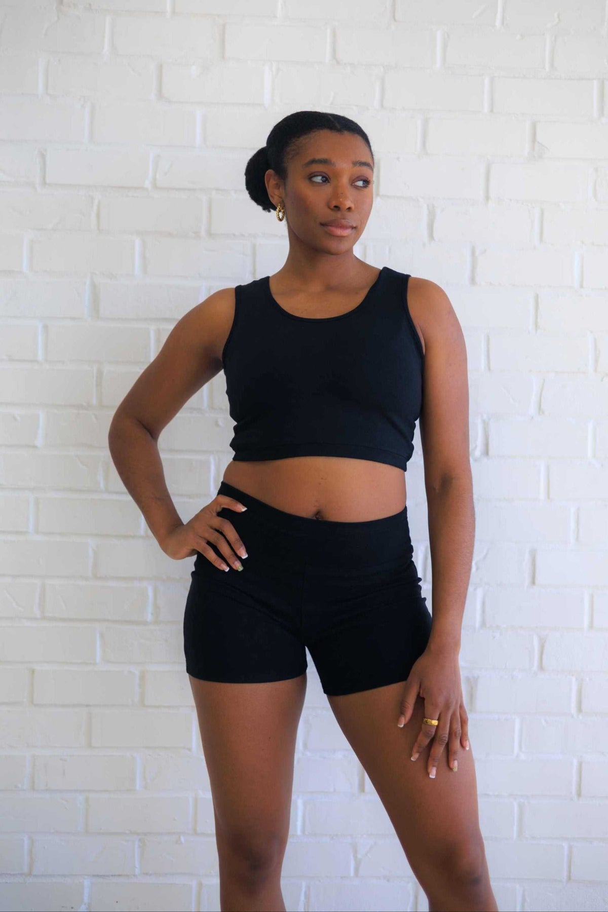 Women's Yoga Shorts in black with a fitted silhouette, wide waistband and smooth solid-color fabric