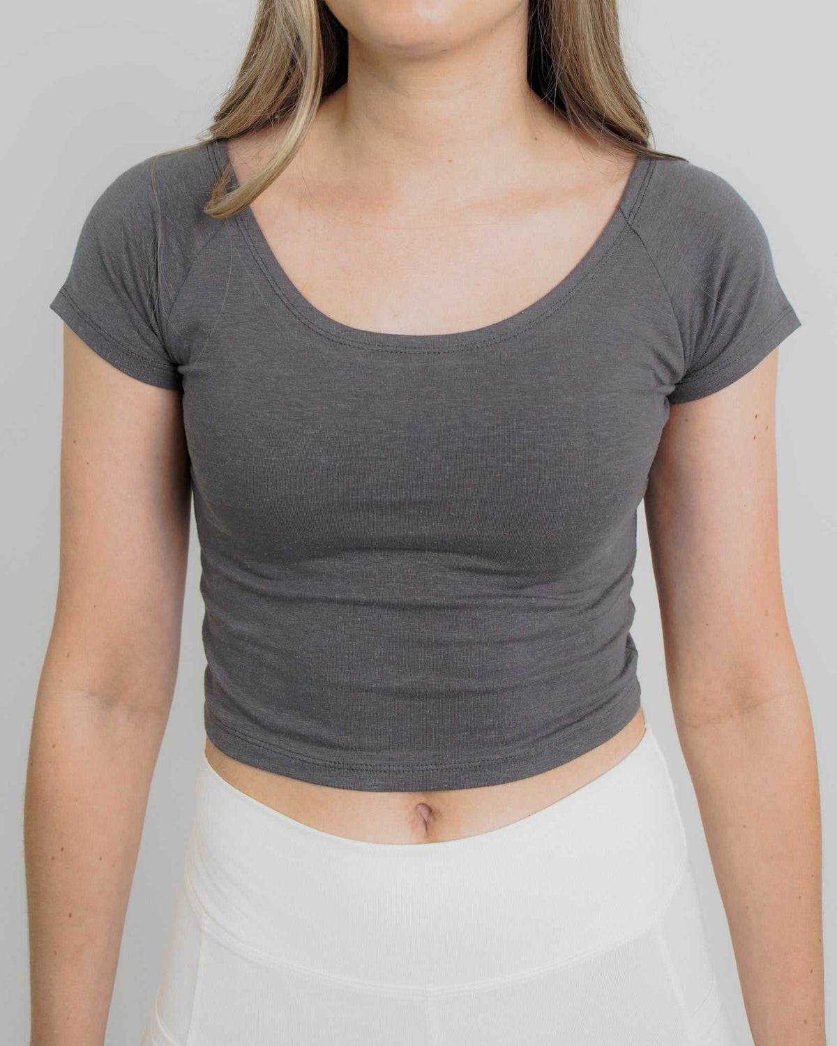 Cotton Crop Top in charcoal gray with a soft, fitted short-sleeve design, scoop neckline and cropped hem