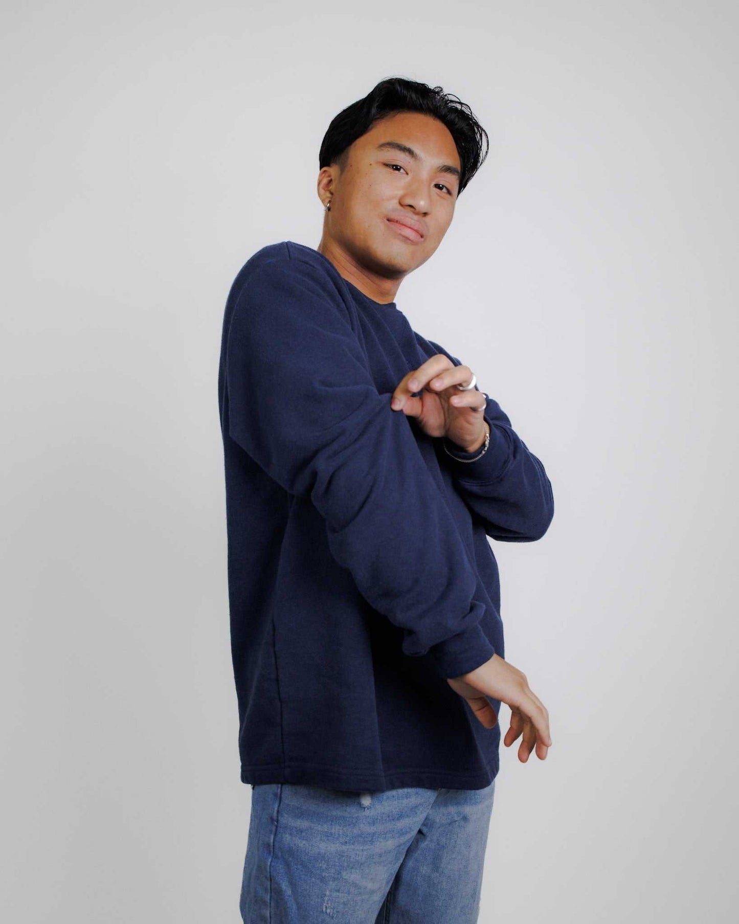 Man wearing navy hemp french terry sweatshirt with crew neck