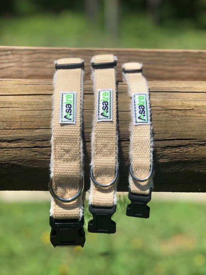 Hemp Dog Collar with beige woven webbing, black plastic buckles and metal D-rings in three adjustable sizes