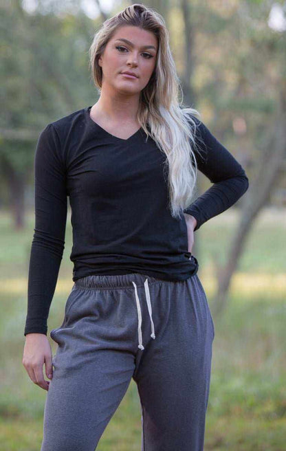 Hemp Shirt in black stretch fabric with long sleeves, a V-neckline, and a fitted silhouette