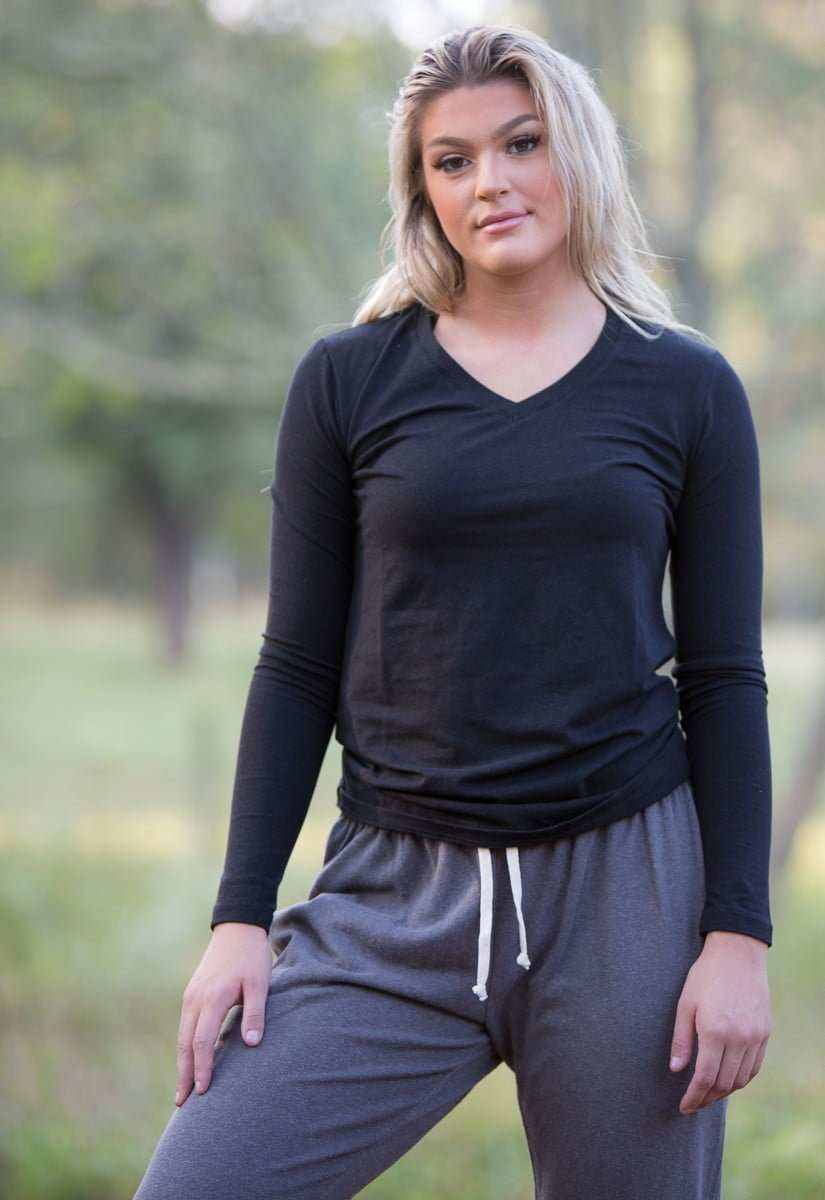 Hemp Shirt in black stretch fabric with a fitted silhouette, long sleeves, and a classic V-neckline