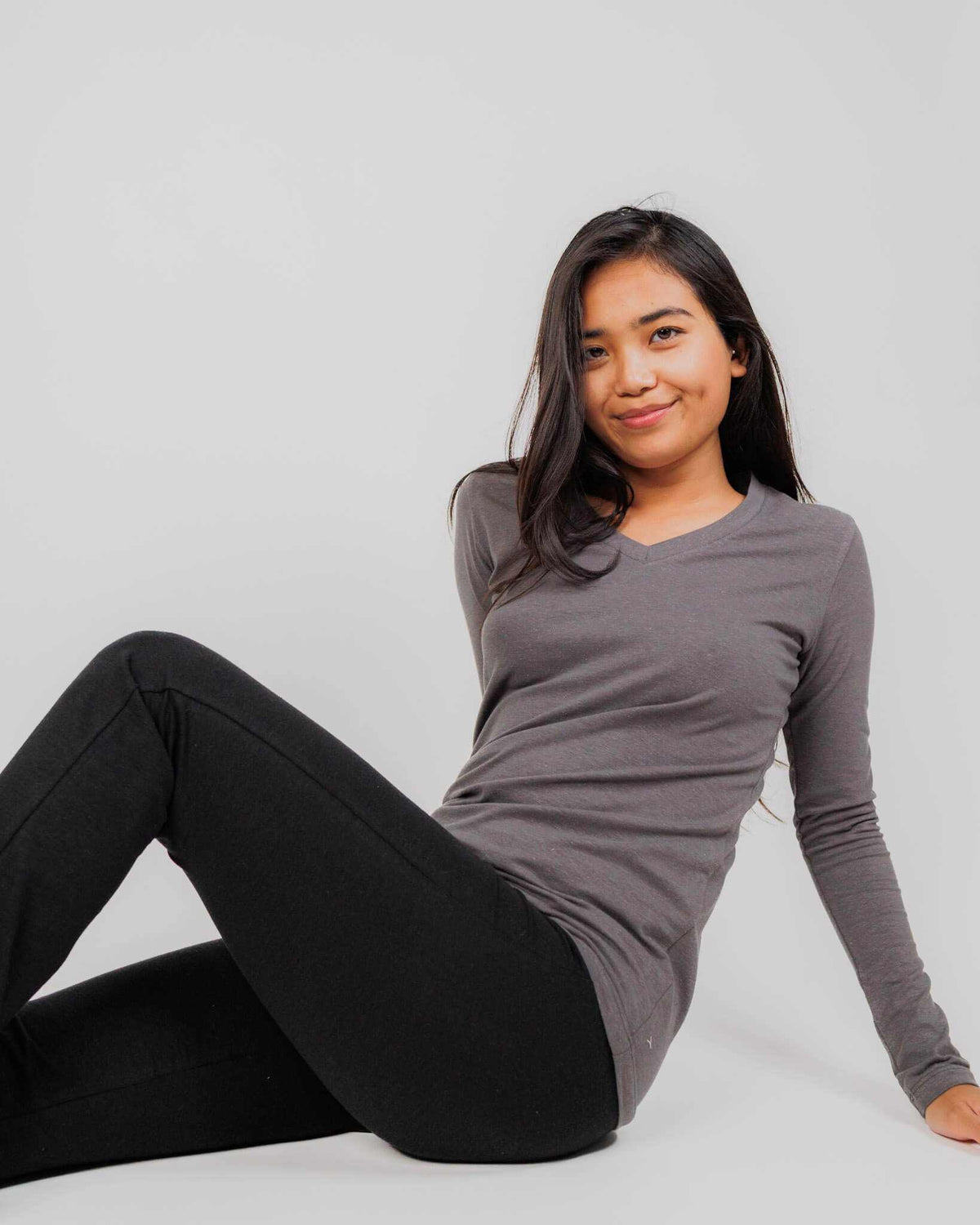 Hemp Shirt in charcoal gray stretch fabric with long sleeves, a fitted silhouette, and a V-neckline