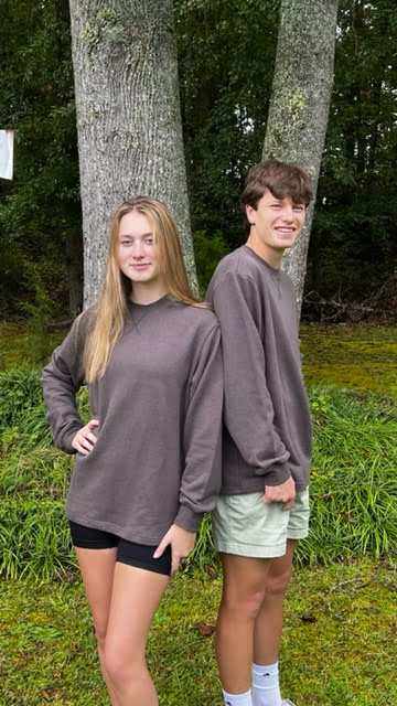Unisex hemp french terry sweatshirt in charcoal gray worn outdoors